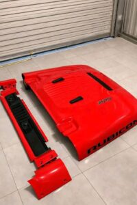 OEM red vented hood for a Jeep Wrangler Rubicon 392.