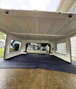 OEM Jeep Wrangler JK hardtop in the rare Rhino color. This is the original factory Mopar 3-piece hardtop that fits all 2007–2018 Jeep Wrangler JK 4-door models (JKU).